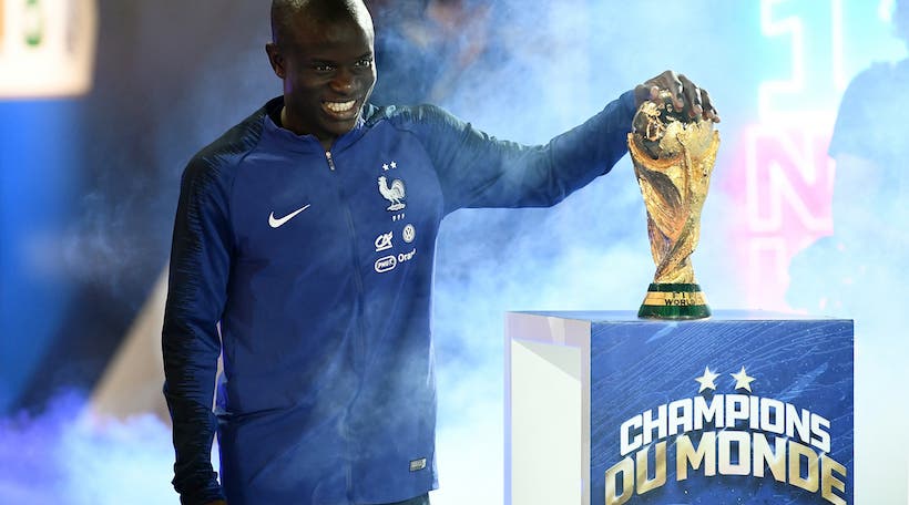 <p>France&#8217;s midfielder N&#8217;Golo Kante looks the 2018 World Cup trophy during a ceremony to celebrate the victory of the 2018 World Cup before the lap of honour at the end of the UEFA Nations League football match between France and Netherlands at the Stade de France stadium, in Saint-Denis, northern of Paris, on September 9, 2018.  / AFP PHOTO / FRANCK FIFE</p>
