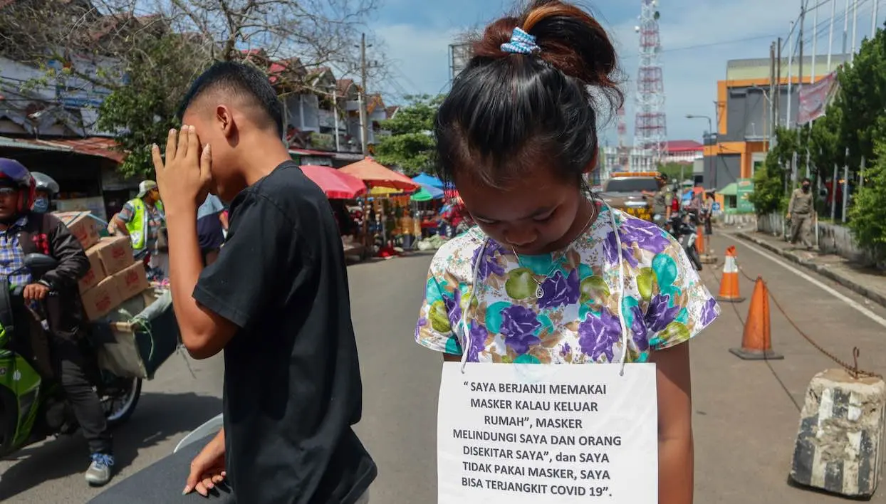 Covid : des Indonésiens envoyés dans une maison hantée pour non-port du masque