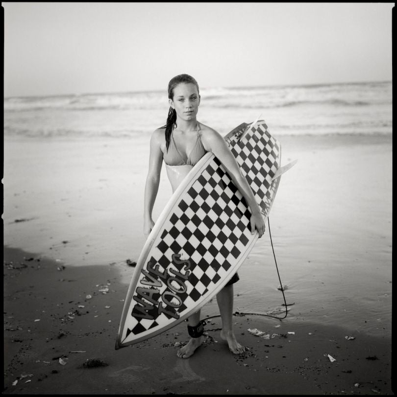 Une jeune fille à la planche à South Padre Island (2002) - Crédit Image Kerry Braun (University of Texas - 2014)